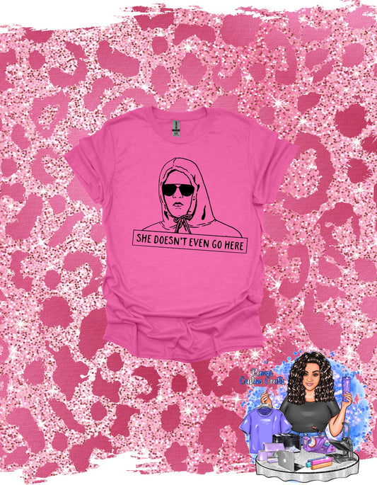 She Doesn't Even Go Here, Funny Means Girls Sublimated Bleached Unisex Shirt