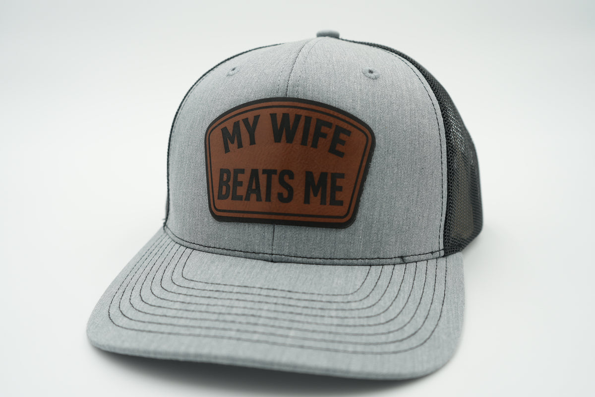 My Wife Beats Me Funny Leather Patch Trucker Hat