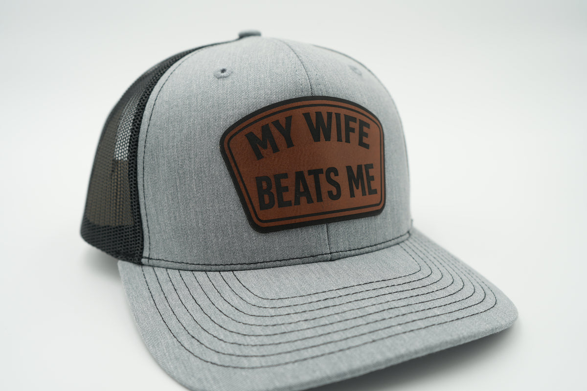 My Wife Beats Me Funny Leather Patch Trucker Hat