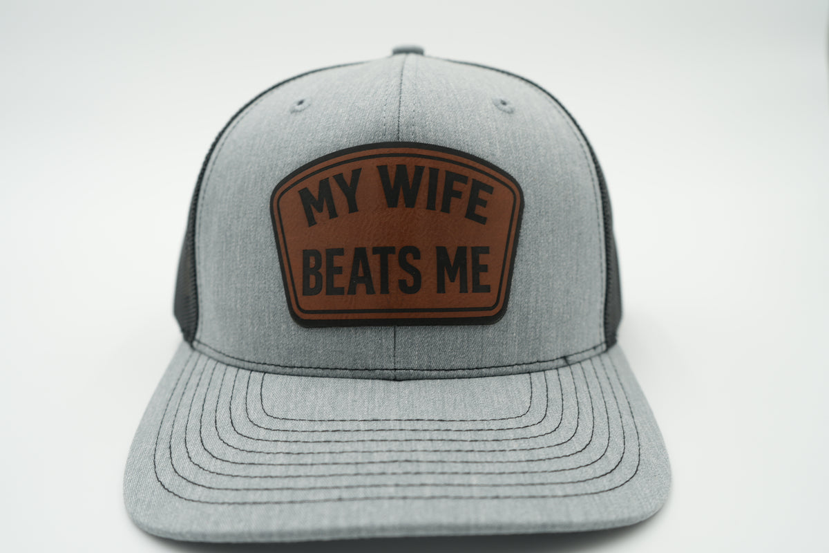 My Wife Beats Me Funny Leather Patch Trucker Hat